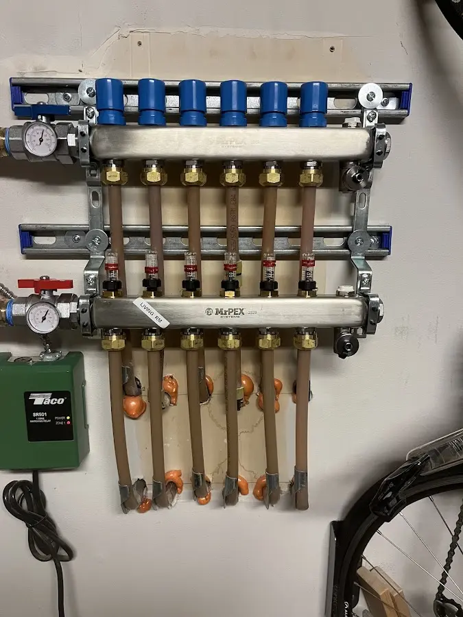 Plumber performing Gas Line Installation at a residential property in Ellsworth